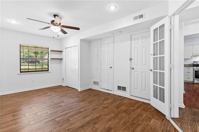 2568 Redfield Dr, Norcross, GA 30071 - unfurnished bedroom with wood finished floors, recessed lighting, baseboards, and ceiling fan