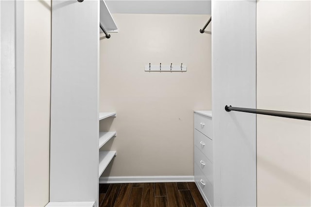 2568 Redfield Dr, Norcross, GA 30071 - spacious closet featuring dark wood finished floors