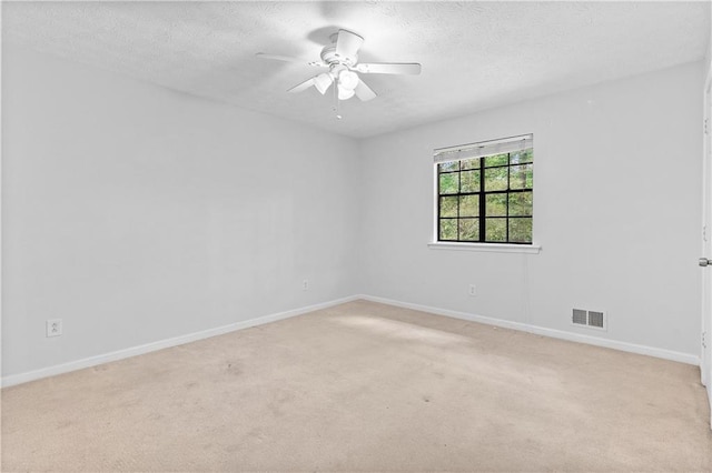 2568 Redfield Dr, Norcross, GA 30071 - empty room featuring light colored carpet, baseboards, and a textured ceiling