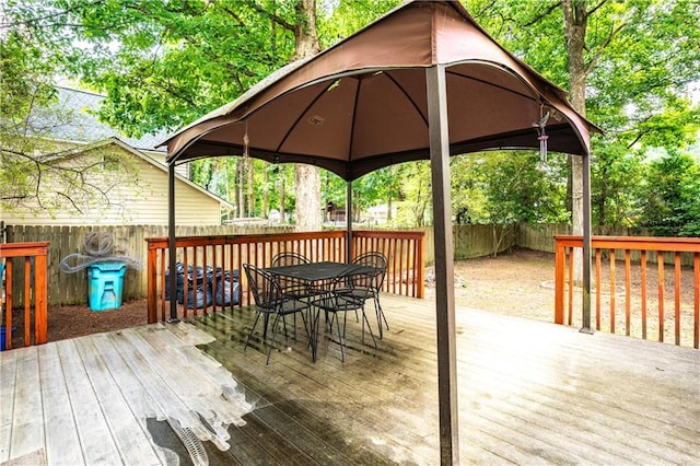 2568 Redfield Dr, Norcross, GA 30071 - wooden terrace with a gazebo, a fenced backyard, and outdoor dining space