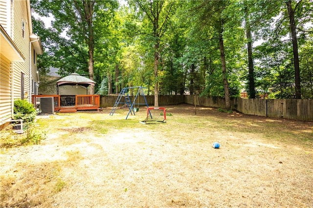 2568 Redfield Dr, Norcross, GA 30071 - fenced backyard with a gazebo, a playground, central air condition unit, and a wooden deck