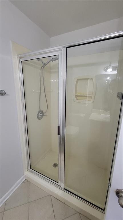 2825 NE Expy NE Unit # F3, Atlanta, GA 30345 - full bath with tile patterned floors, a stall shower, and baseboards