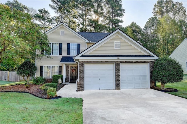 traditional-style house featuring a garage, fence, concrete driveway, and brick siding