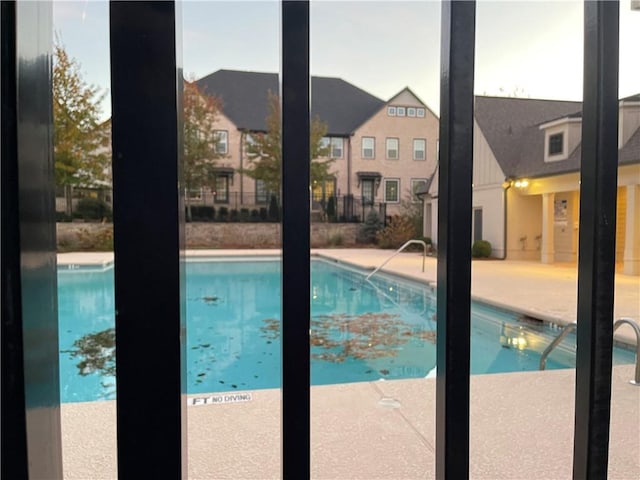 view of pool with a patio area