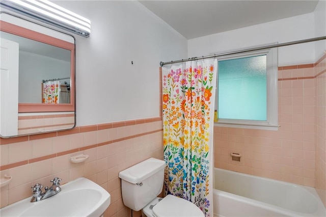 407 E College St E, Bowdon, GA 30108 - bathroom with shower / tub combo, tile walls, and a wainscoted wall
