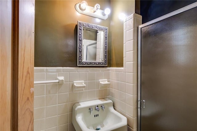 407 E College St E, Bowdon, GA 30108 - full bath with a shower stall, tile walls, and a wainscoted wall