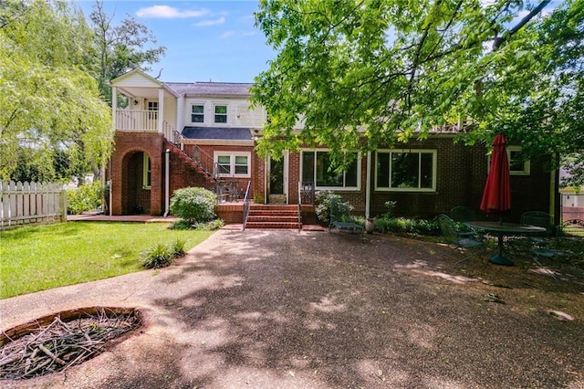 407 E College St E, Bowdon, GA 30108 - view of front of property featuring brick siding and stairway