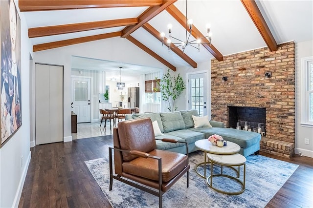 living area featuring a fireplace, baseboards, a chandelier, vaulted ceiling with beams, and dark wood-type flooring
