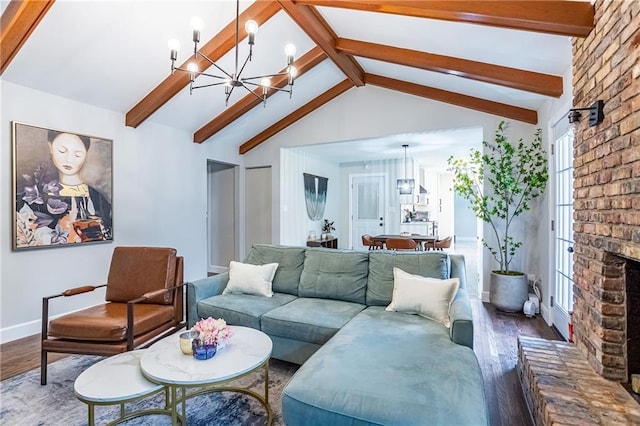 living area with lofted ceiling with beams, wood finished floors, and a chandelier