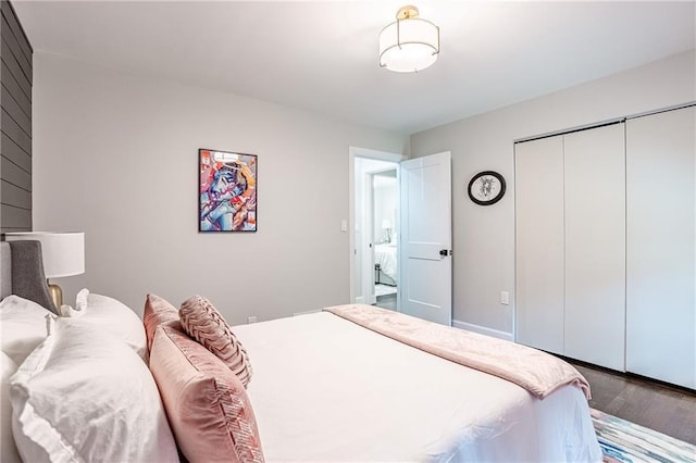 bedroom featuring a closet and wood finished floors