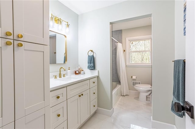 bathroom with visible vents, vanity, marble finish floor, toilet, and baseboards