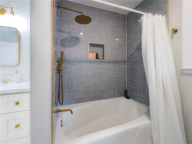 full bathroom featuring shower / bath combo with shower curtain and vanity