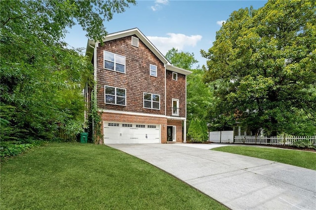 view of front of house with a garage, driveway, a front lawn, and fence