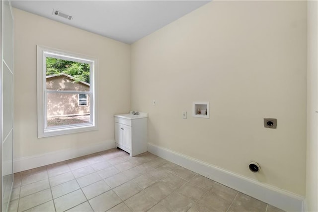 washroom featuring washer hookup, visible vents, hookup for an electric dryer, laundry area, and baseboards