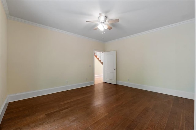 unfurnished room featuring crown molding, baseboards, ceiling fan, and wood finished floors