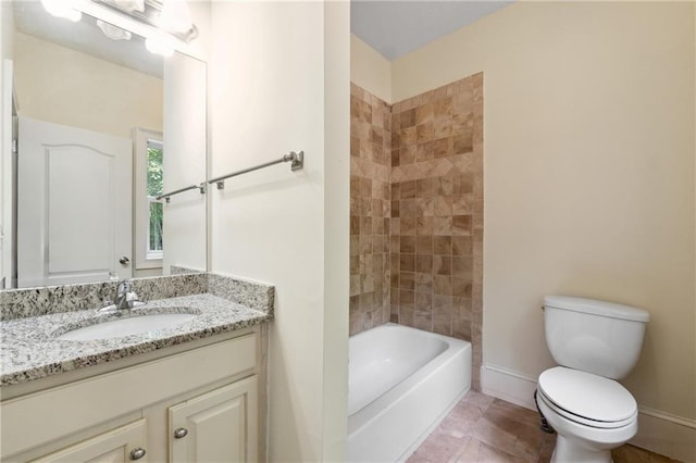 full bath with  shower combination, baseboards, vanity, and toilet