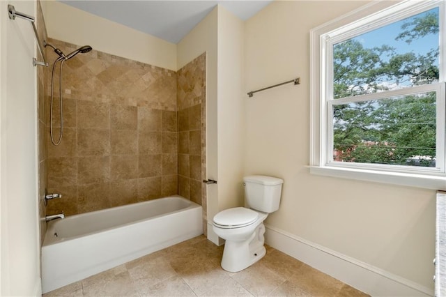 bathroom with  shower combination, baseboards, toilet, and tile patterned floors