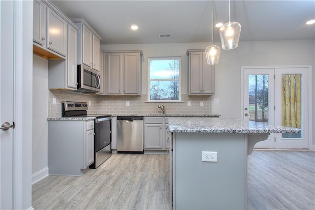 119 Greenview Ct Unit 1303, Homer, GA 30547 - kitchen featuring appliances with stainless steel finishes, light wood-style floors, healthy amount of natural light, and recessed lighting
