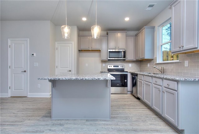 119 Greenview Ct Unit 1303, Homer, GA 30547 - kitchen with stainless steel appliances, gray cabinets, light wood-style floors, tasteful backsplash, and recessed lighting