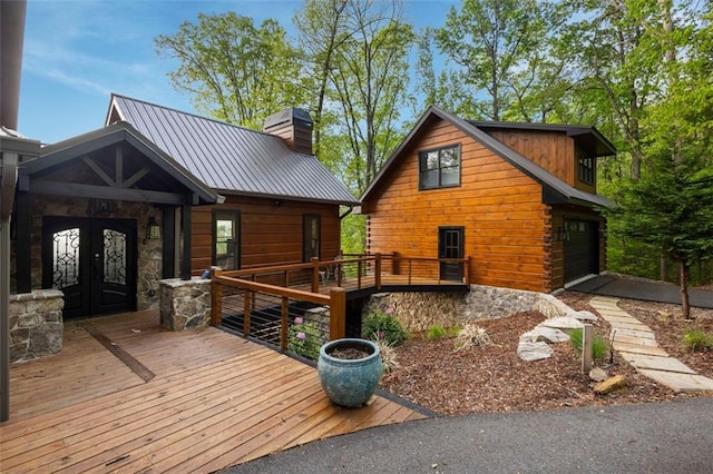 851 N Moreland Dr N, Blue Ridge, GA 30513 - deck with an attached garage and french doors