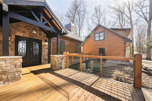 wooden deck with french doors