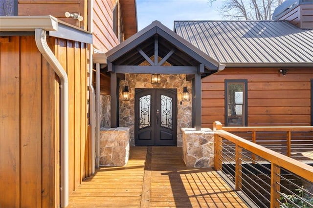 851 N Moreland Dr N, Blue Ridge, GA 30513 - property entrance with french doors, metal roof, and stone siding