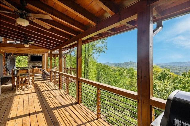 851 N Moreland Dr N, Blue Ridge, GA 30513 - deck with a view of trees, ceiling fan, and a mountain view