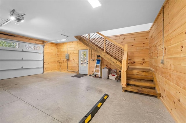 851 N Moreland Dr N, Blue Ridge, GA 30513 - garage featuring wooden walls and a garage door opener