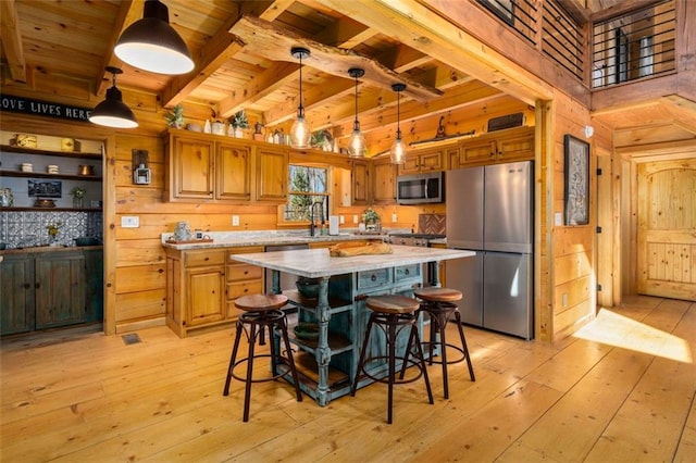 851 N Moreland Dr N, Blue Ridge, GA 30513 - kitchen with light countertops, wood ceiling, appliances with stainless steel finishes, and wood walls
