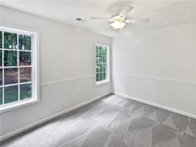 200 Eagle Glen Ct, Woodstock, GA 30189 - unfurnished room with healthy amount of natural light, carpet flooring, baseboards, and a ceiling fan