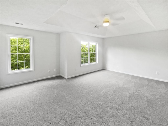 200 Eagle Glen Ct, Woodstock, GA 30189 - empty room with carpet, baseboards, a ceiling fan, and a raised ceiling