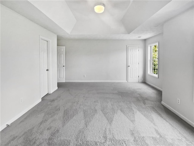 200 Eagle Glen Ct, Woodstock, GA 30189 - spare room with a raised ceiling, carpet floors, and baseboards