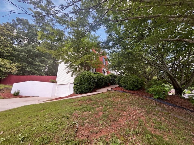 200 Eagle Glen Ct, Woodstock, GA 30189 - view of yard with an attached garage and concrete driveway
