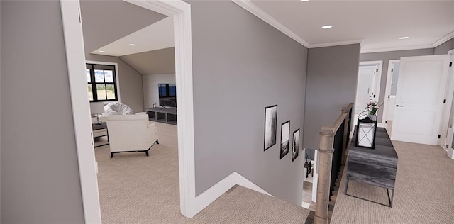 corridor featuring lofted ceiling, crown molding, and light colored carpet