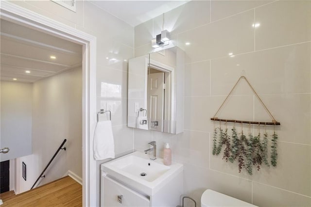 half bath with toilet and vanity
