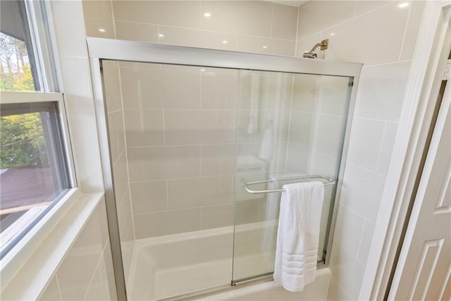 full bath with a shower stall