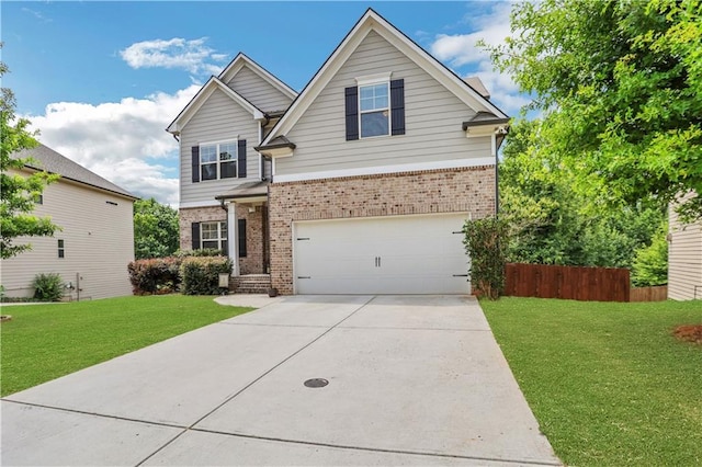 craftsman-style home with an attached garage, driveway, fence, and brick siding
