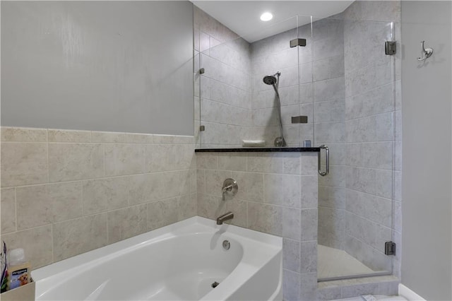 855 Peachtree St NE Unit 1703, Atlanta, GA 30308 - full bath featuring a garden tub and a shower stall