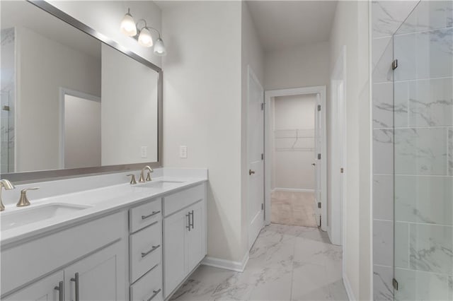 bathroom featuring vanity and a shower