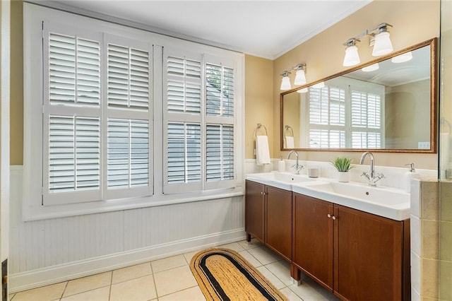 bathroom featuring ornamental molding, tile patterned flooring, and plenty of natural light