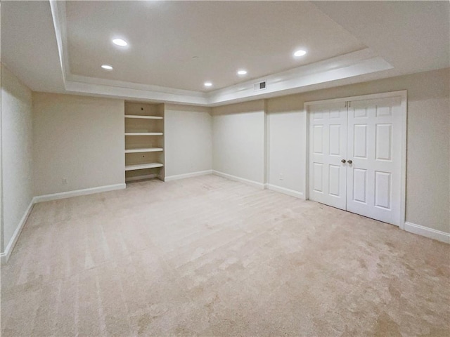 finished basement featuring carpet floors, recessed lighting, visible vents, and baseboards