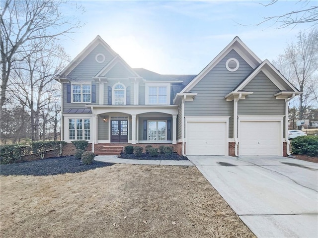 view of front of home with a porch, concrete driveway, brick siding, and an attached garage