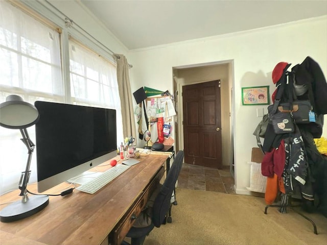 carpeted office with ornamental molding