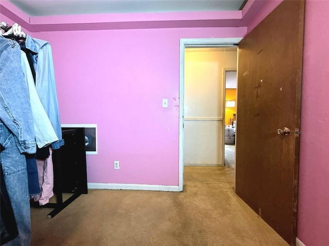 carpeted bedroom with baseboards