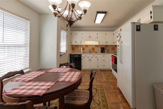 bi-level home with a front lawn and fence