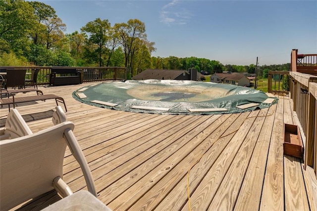 back of house with a lawn and a wooden deck