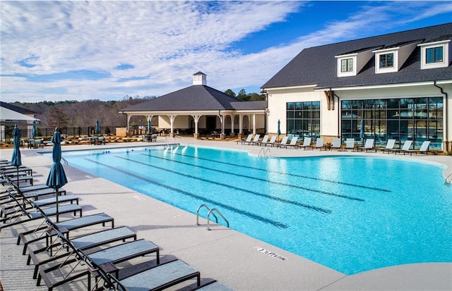 view of pool featuring a patio