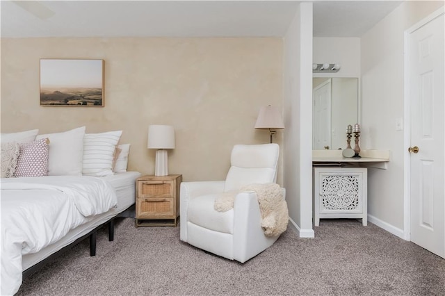 bedroom with carpet flooring and baseboards