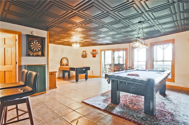 rec room featuring a fireplace, light tile patterned flooring, and billiards