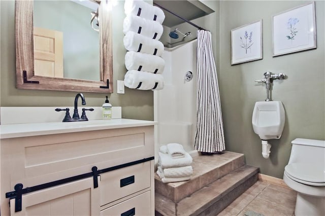 bathroom with vanity, toilet, a shower with curtain, and tile patterned floors